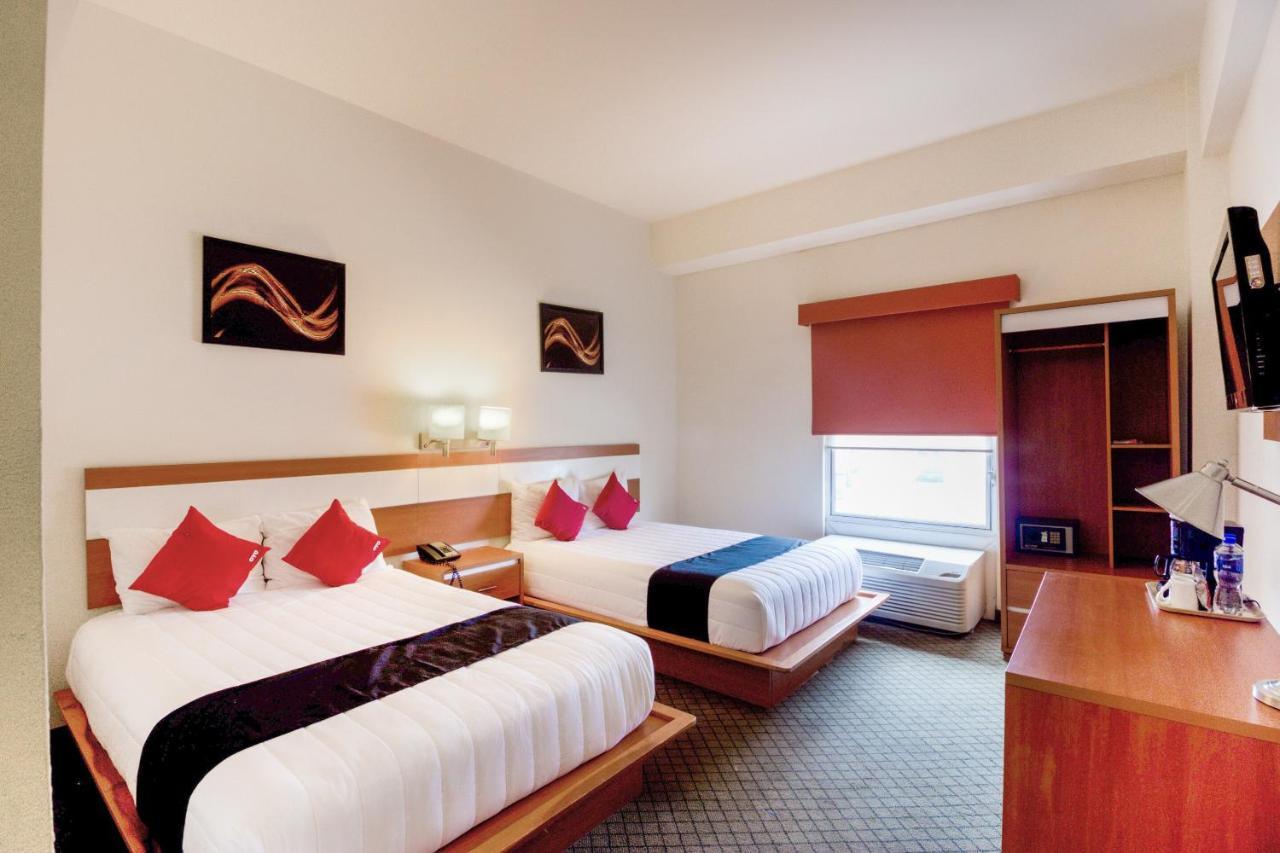 Capital O Hotel Herederos, Пьедрас-Неграс Экстерьер фото