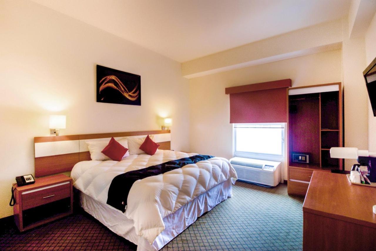 Capital O Hotel Herederos, Пьедрас-Неграс Экстерьер фото