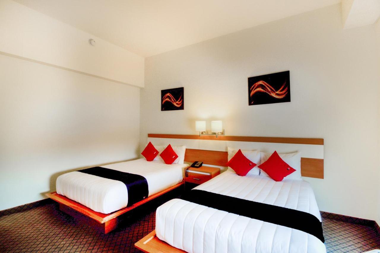 Capital O Hotel Herederos, Пьедрас-Неграс Экстерьер фото