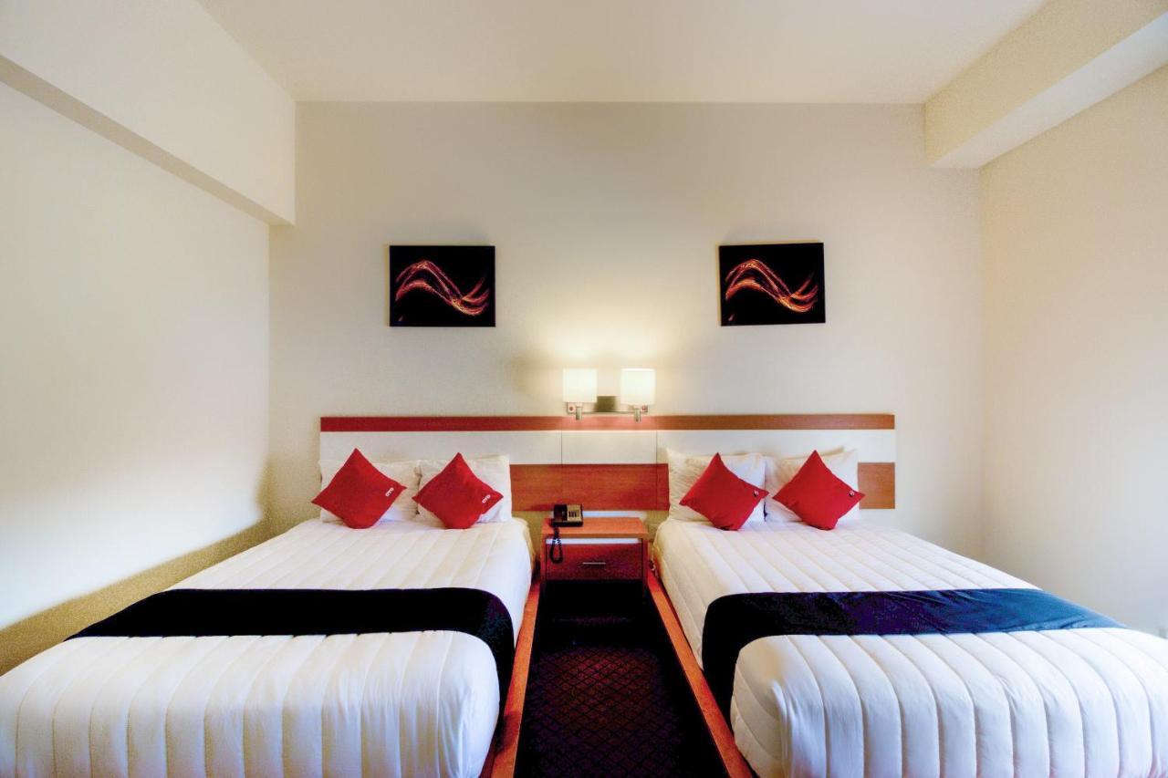 Capital O Hotel Herederos, Пьедрас-Неграс Экстерьер фото
