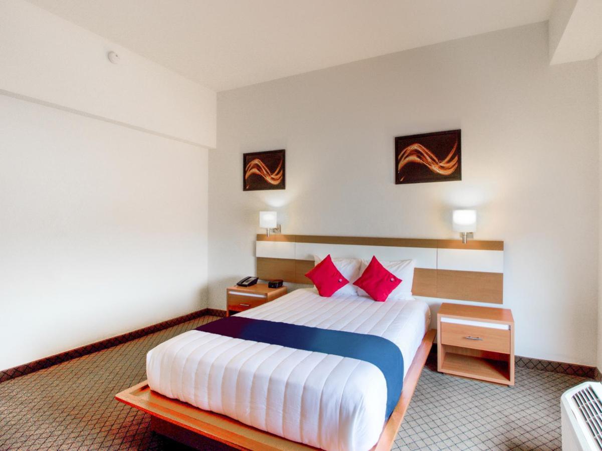 Capital O Hotel Herederos, Пьедрас-Неграс Экстерьер фото