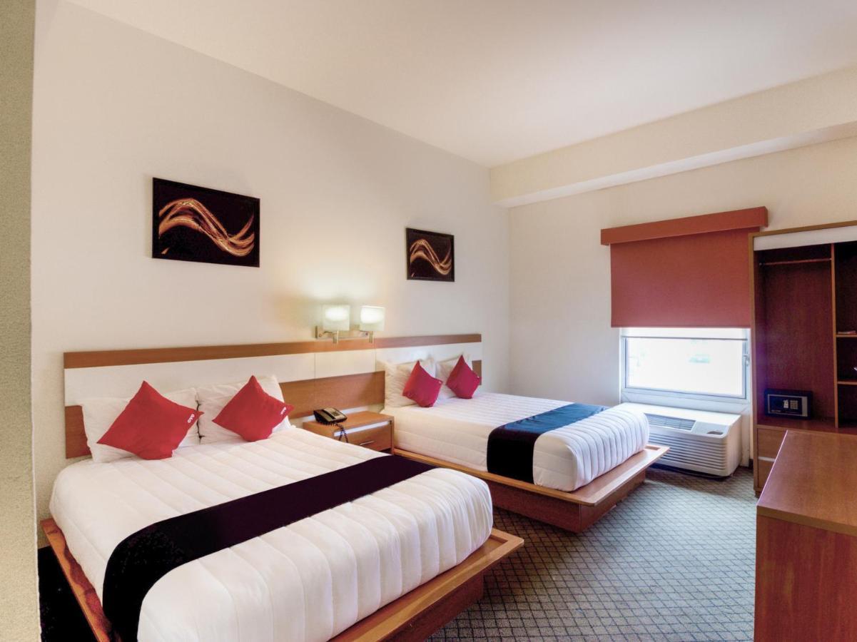 Capital O Hotel Herederos, Пьедрас-Неграс Экстерьер фото